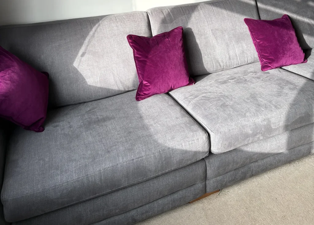 Sofa in Burton upon Trent with freshly refilled cushions, restored shape and improved comfort