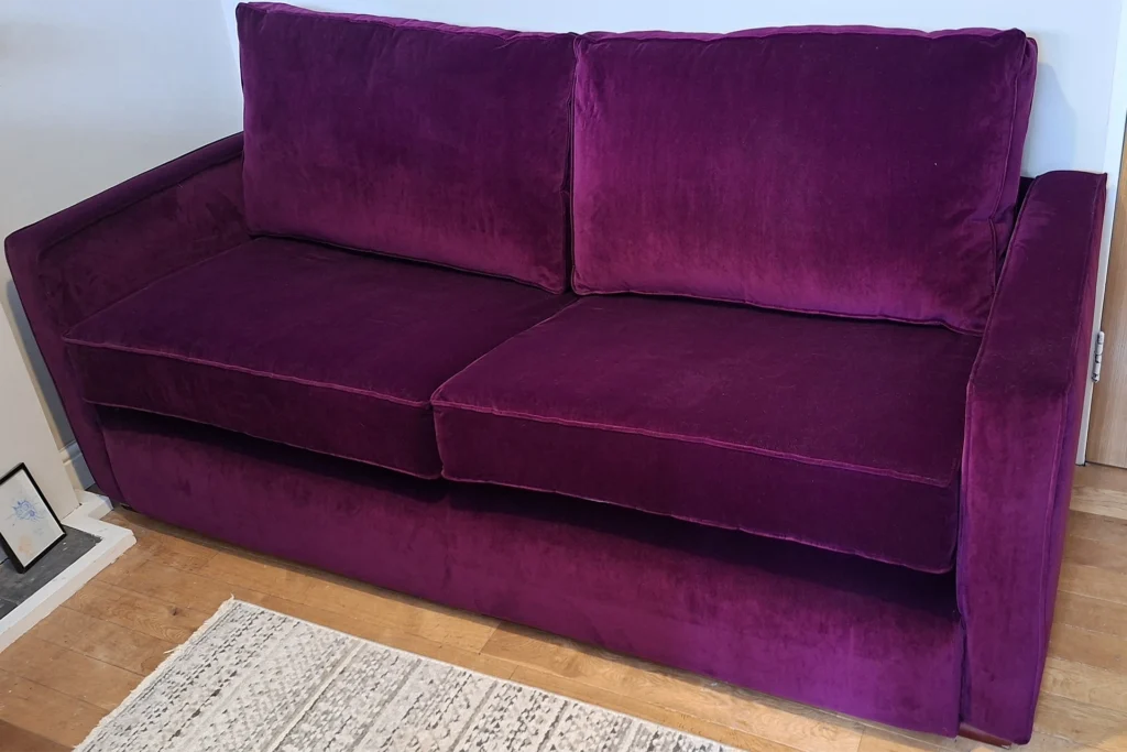 a three seater sofa with new seat and back cushion replacement in Loughborough